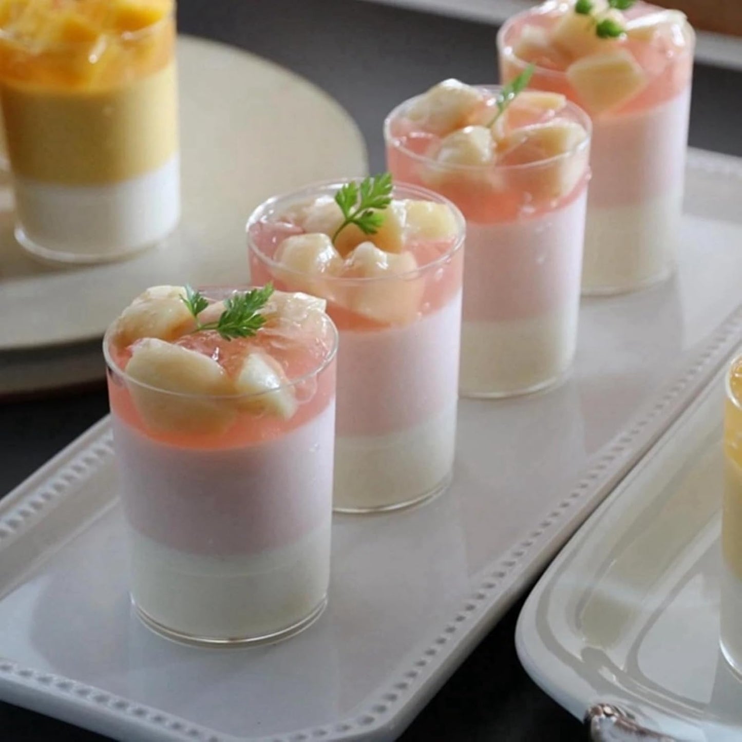 100 Pack Mini Dessert Cups, 3oz Clear Shooter Cups with Spoons, Plastic Mousse Cups for Party, Ice Cream, Puddings, Chocolate, Round Appetizer Parfait Tasting Cups